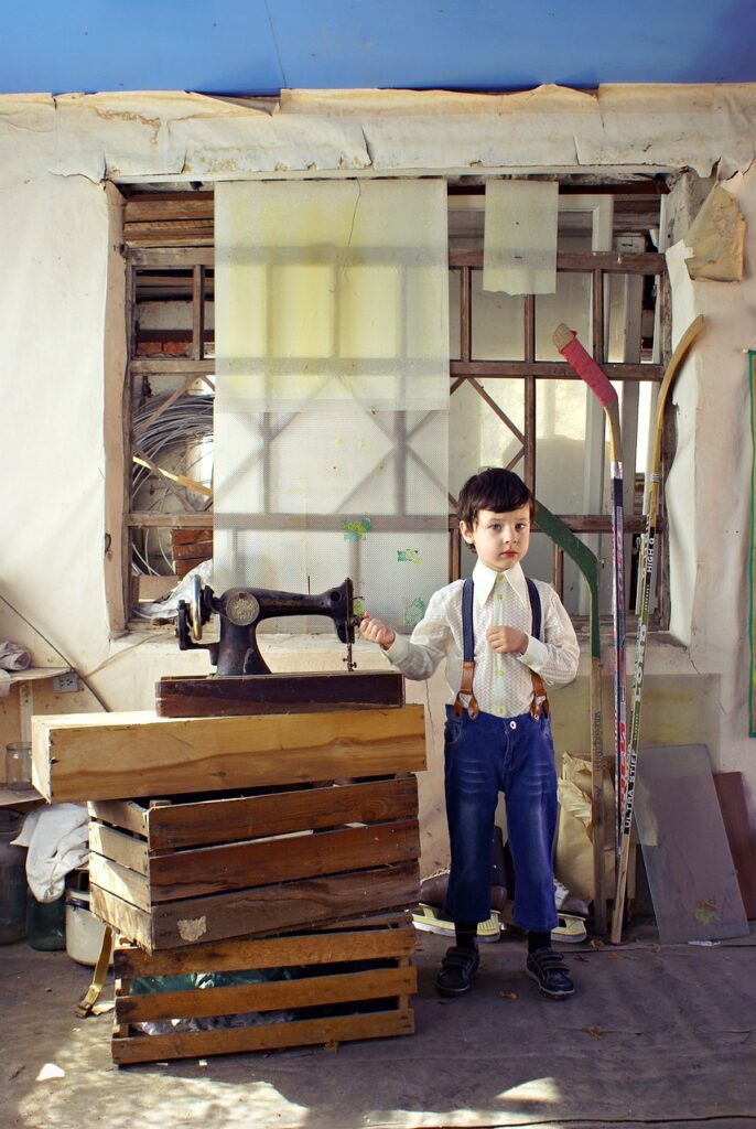 rustic, boy, sewing machine, barn, rural landscape, european boy, small child, a cute baby, pantry, boxes