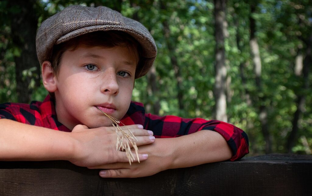 boy, blade of grass, outside the city, rustic, kids, baby, teen, checkered shirt, cap, person, portrait, people, childhood, european, slav